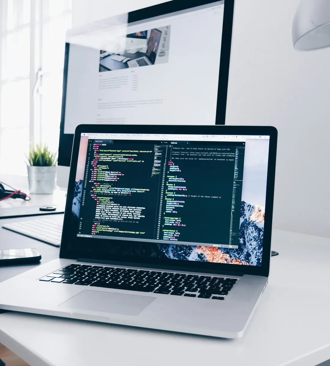 Photo by Christopher Gower on Unsplash MacBook on desk with the code editor opened